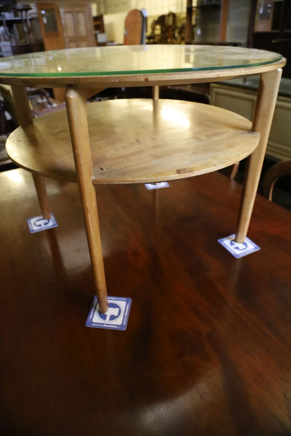 A 1950s satin maple circular occasional table, 64cm diameter, 52cm high